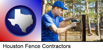 fence builder attaching fencing to a fence post in Houston, TX