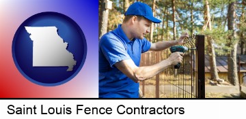 fence builder attaching fencing to a fence post in Saint Louis, MO