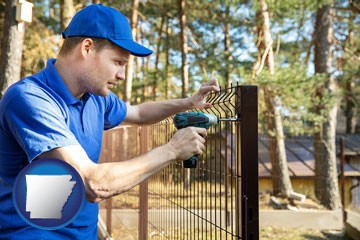 fence builder attaching fencing to a fence post - with Arkansas icon